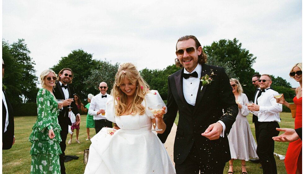 Whimsical Tuscan-Inspired Wedding in Hampshire |  Confetti throw on bride and groom as they are arriving to their Tuscan inspired wedding party in Hampshire