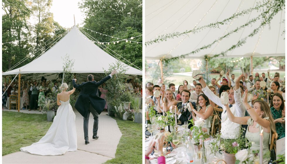 The bride and groom are arriving at their garden wedding marquee as guests cheer from tables.