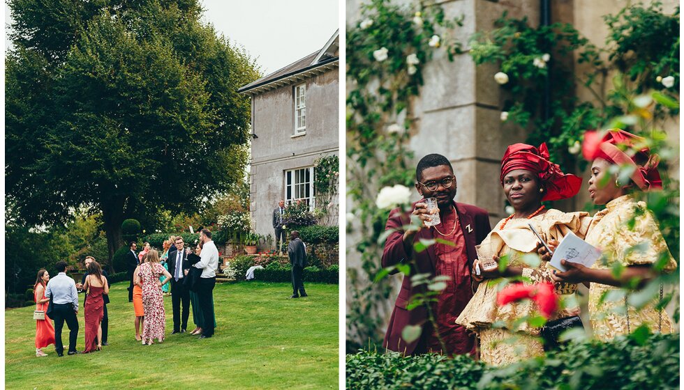 Guests enjoy a drink reception in the blooming wedding garden venue in Sussex.