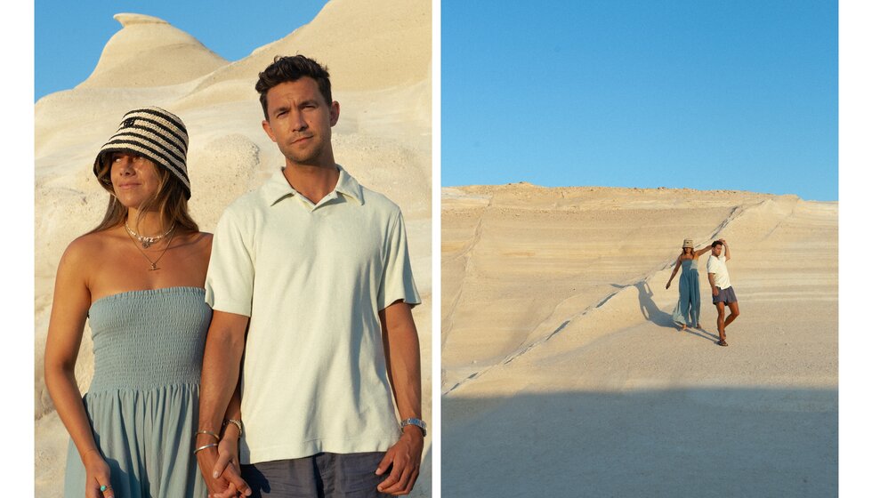 A couple, Emily Champion and Nick Leatherbarrow, pose in front of the sand dune during their holiday together.