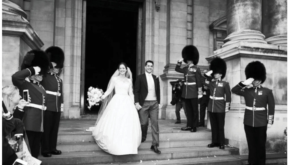 The newly married couple leave the Church