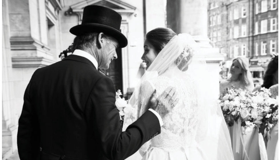 The bride and her father outside the church