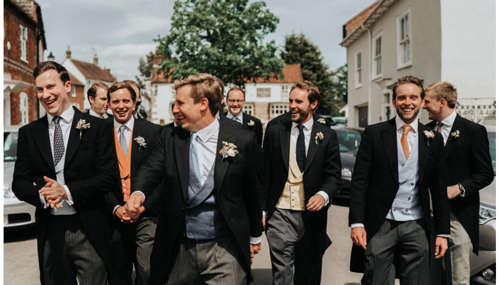 Ed and his ushers walking to the church before the ceremony.