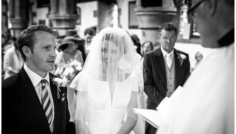 Min and Duncan at the alter - showing Min's veil.