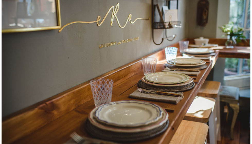 The breakfast bar styled by us. On the wall is ERA calligraphy's sign.