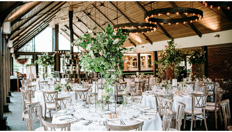 The beautiful interior of Syrencot, decorated with botanical flowers and statement lights