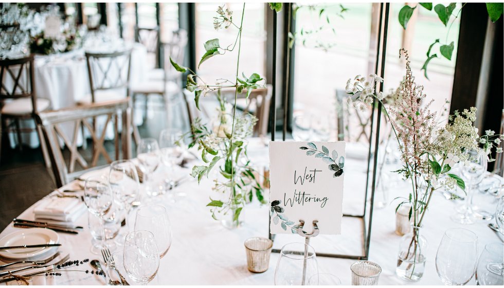 Flowers on the tables at the wedding reception. 