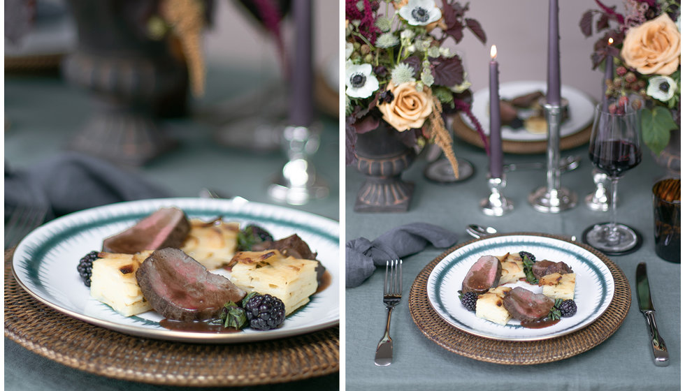 The main course of perfectly cooked venison served with potatoes, seasonal greens and foraged blackberries.