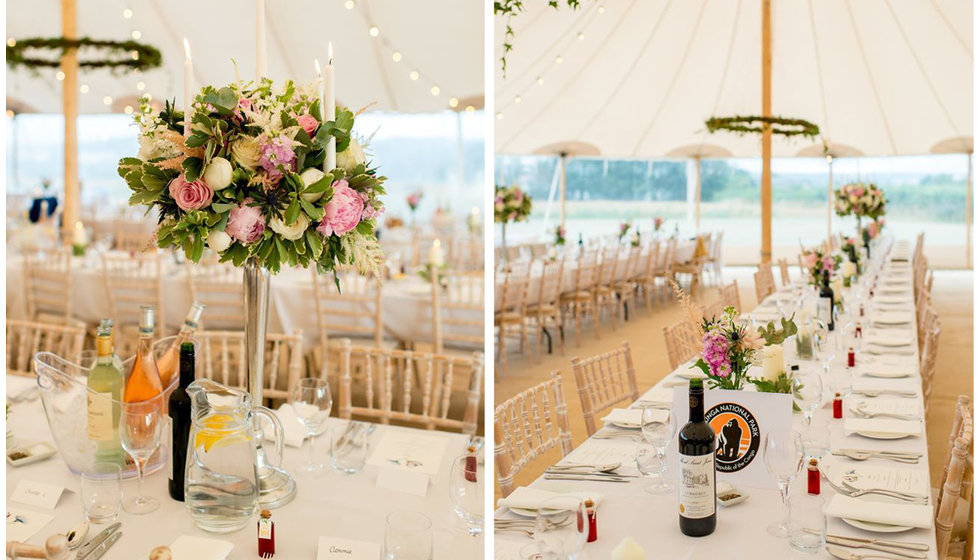 The decor of the marquee with pink and green flowers.