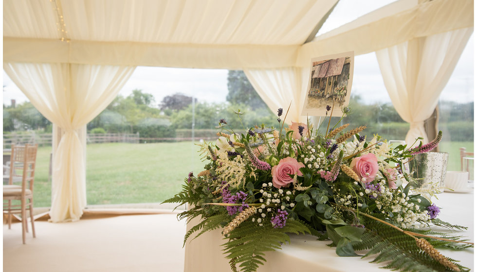 Beautiful floral arrangements designed by the bride and her mother.