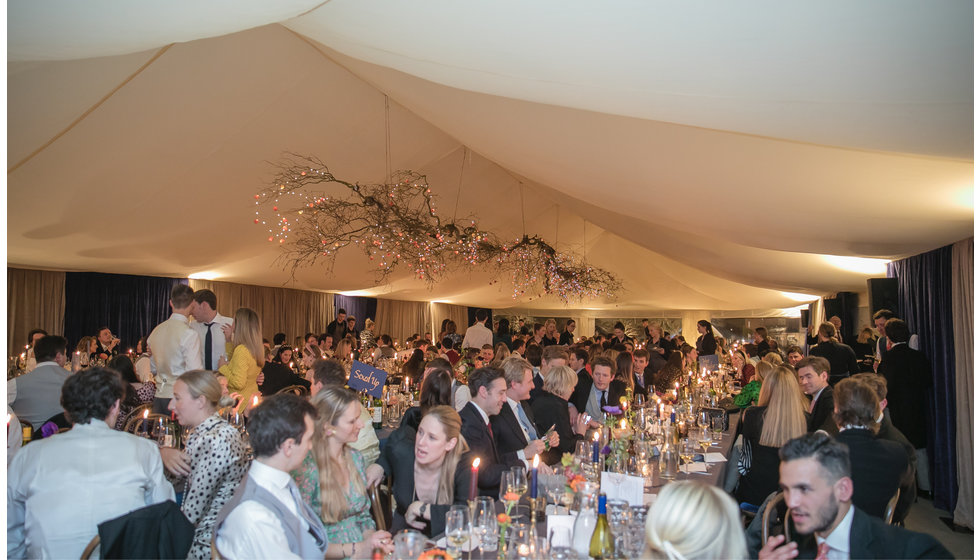 All the guests at the wedding dining.