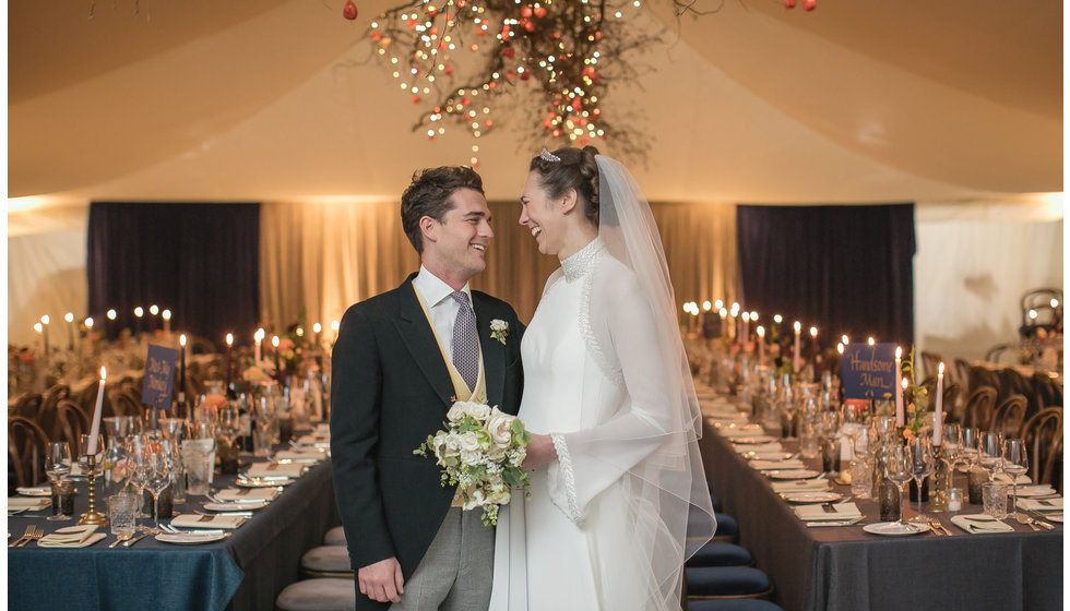 Will and Tania in their beautifully decorated marquee.