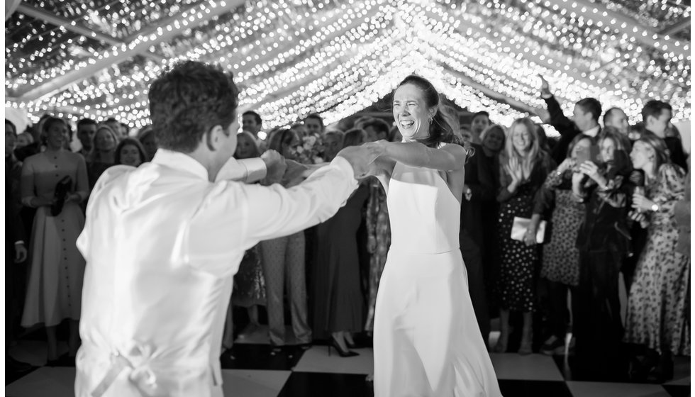 The bride and groom doing their first dance together.