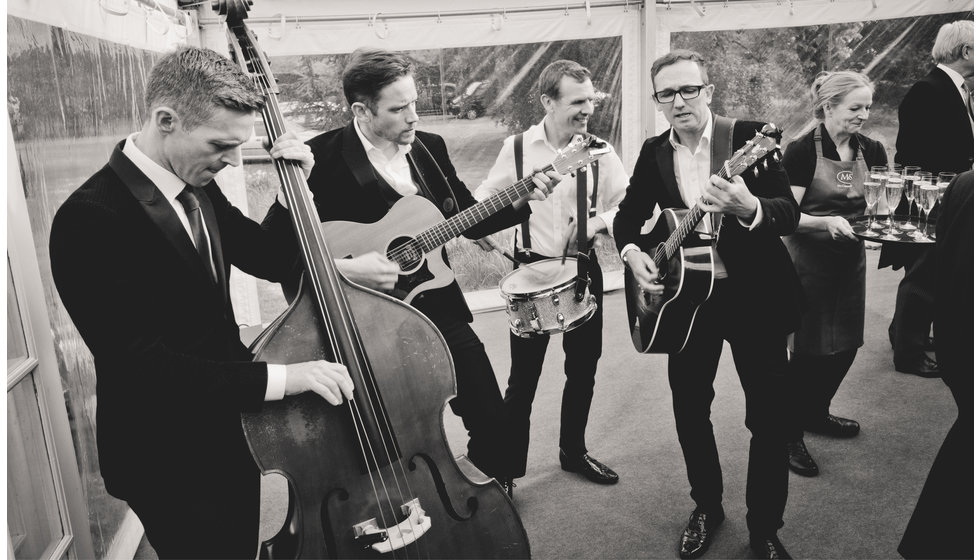 The diamond boys performing to the guests in the marquee.