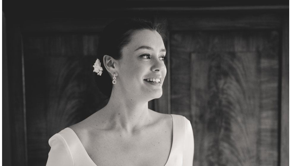 A black and white portrait of the bride.