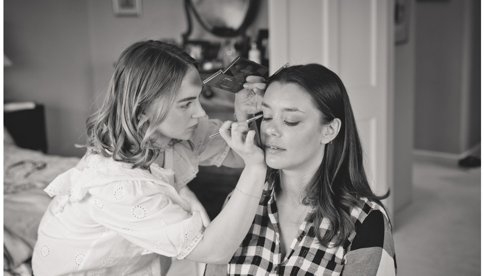 The bride having her make up done.