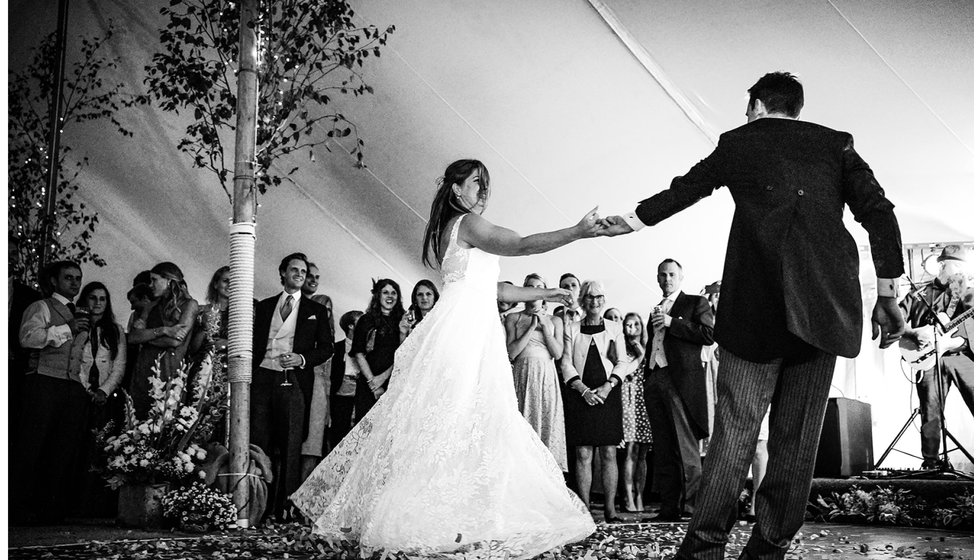 The bride and groom doing their first dance.