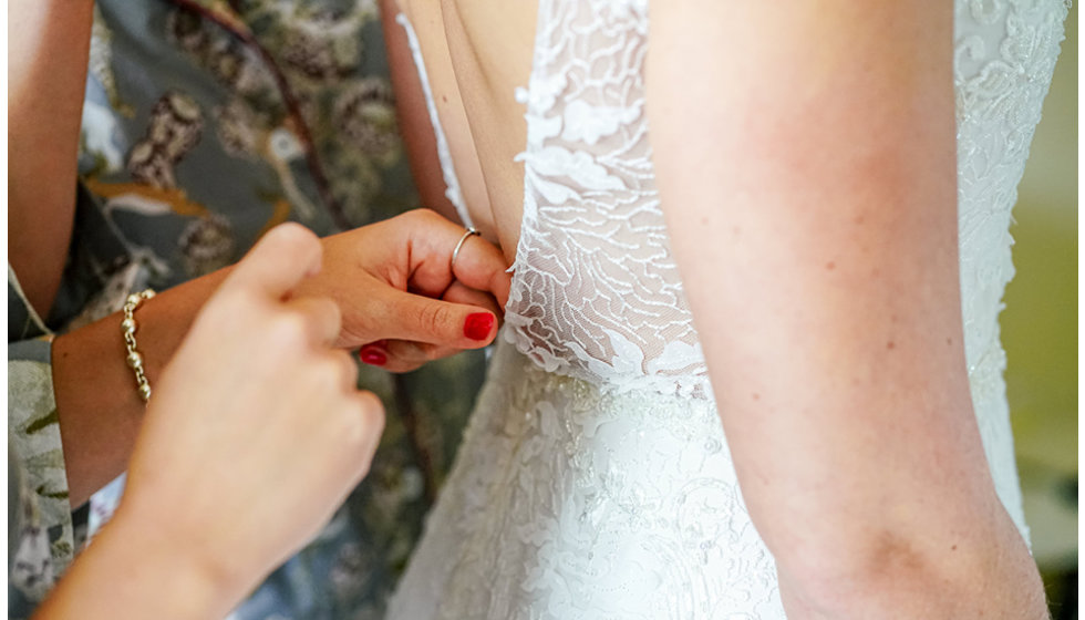 Details of the back of the brides dress.