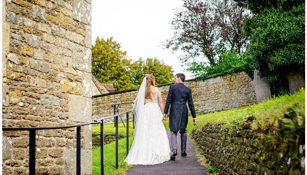 The bride and groom leaving the Church.