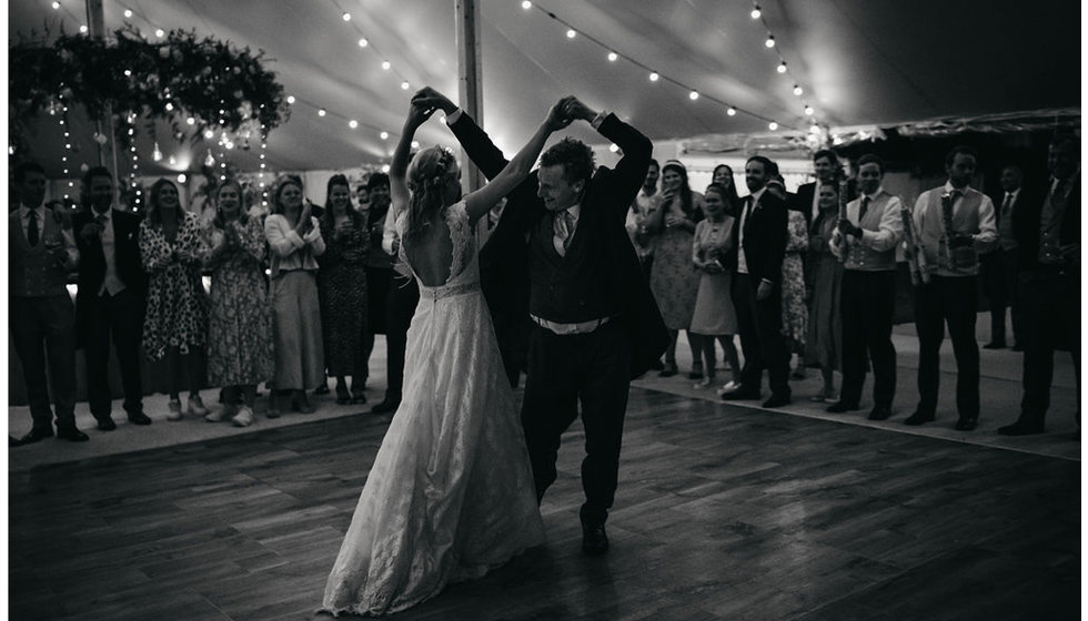 Bride and groom Harriet and Ed dancing their first dance.