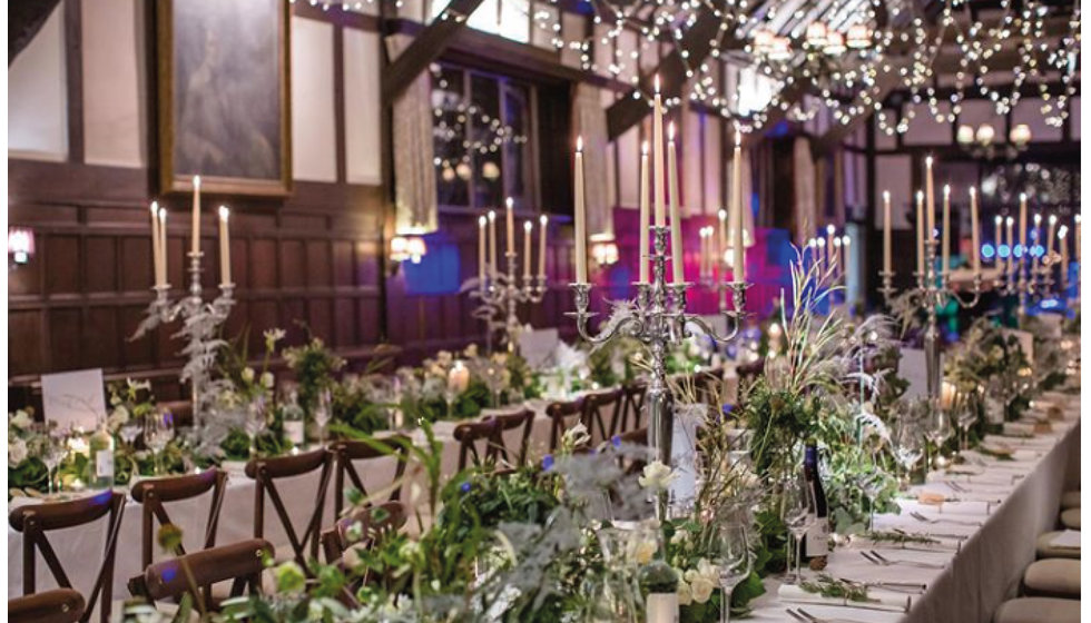 A beautiful room filled with winter florals and fairy lights.