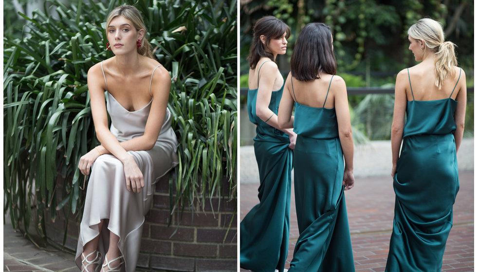 A bridesmaid wearing a grey slip dress and three bridesmaids walking away wearing dark green silk slip dresses.