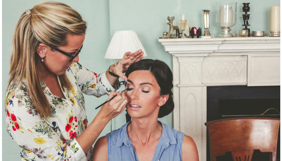 Sophie doing the make up on one of her bride's on her wedding morning.