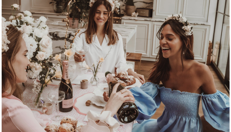 Bride to be and her bridesmaids enjoying some champagne.