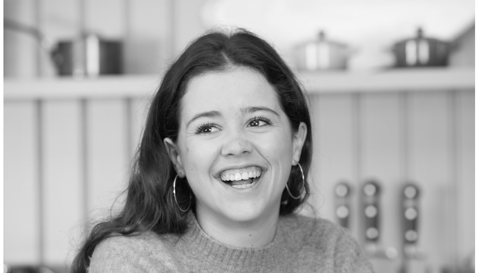 Black and white portrait of Lucy one of the wedding list advisors.