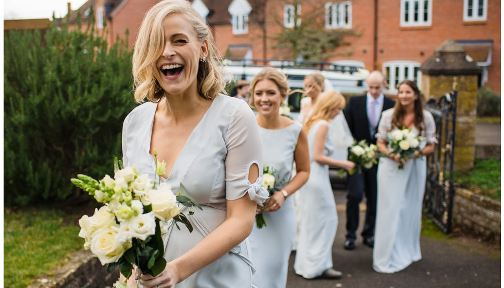 The bridesmaids enter the Church.