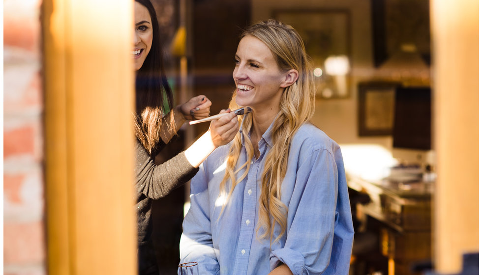 The bride having her make up done.