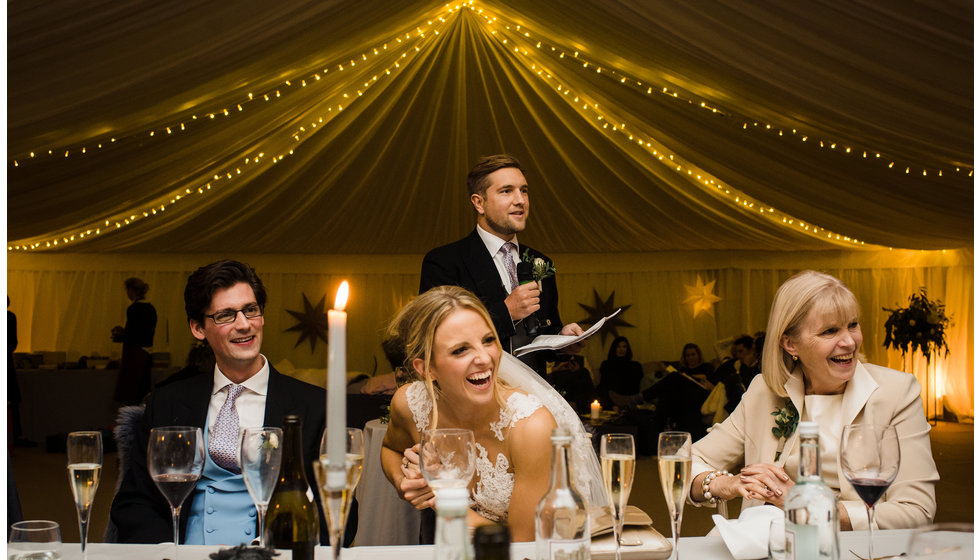 The bride and her family in the marquee.