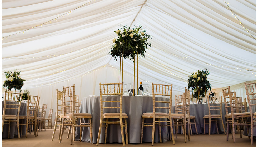 The flowers in the marquee.