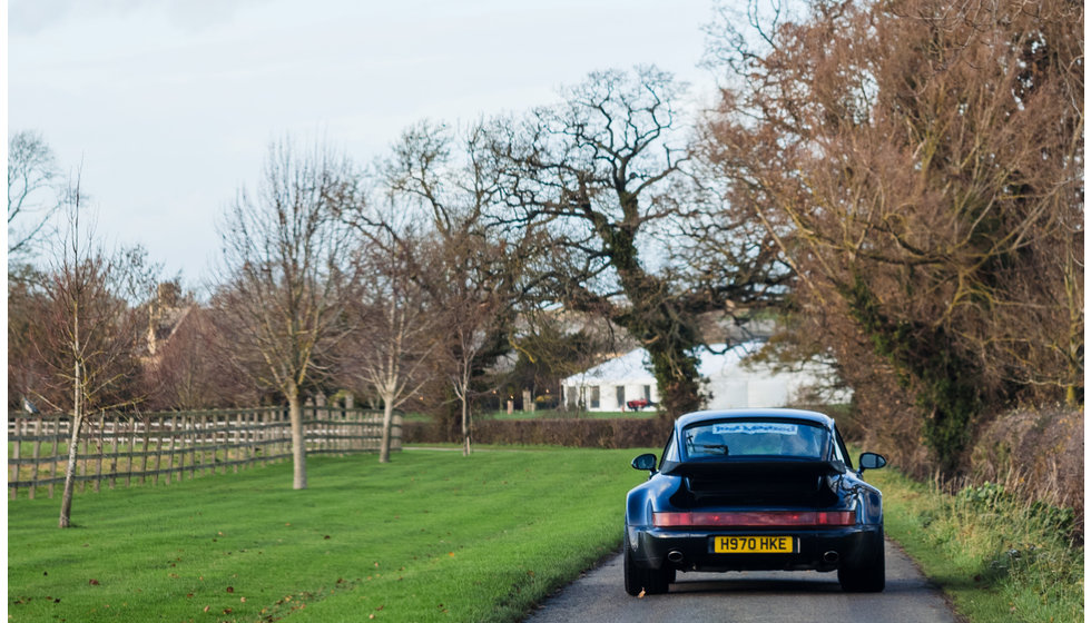 The couple drive away in a porcshe.