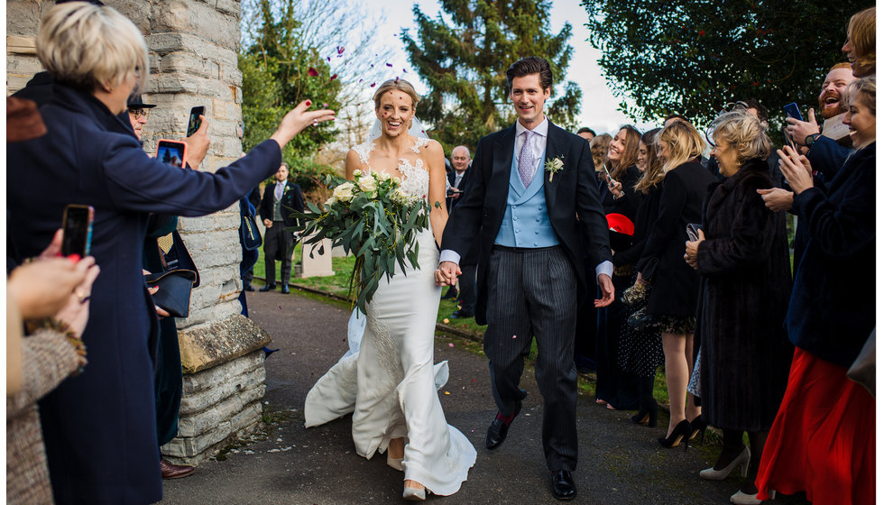 The bride and groom exiting the Church.