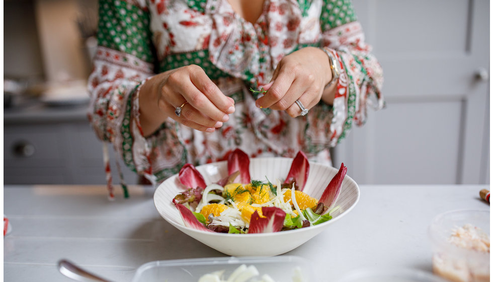 Georgie preparing another fresh salad.