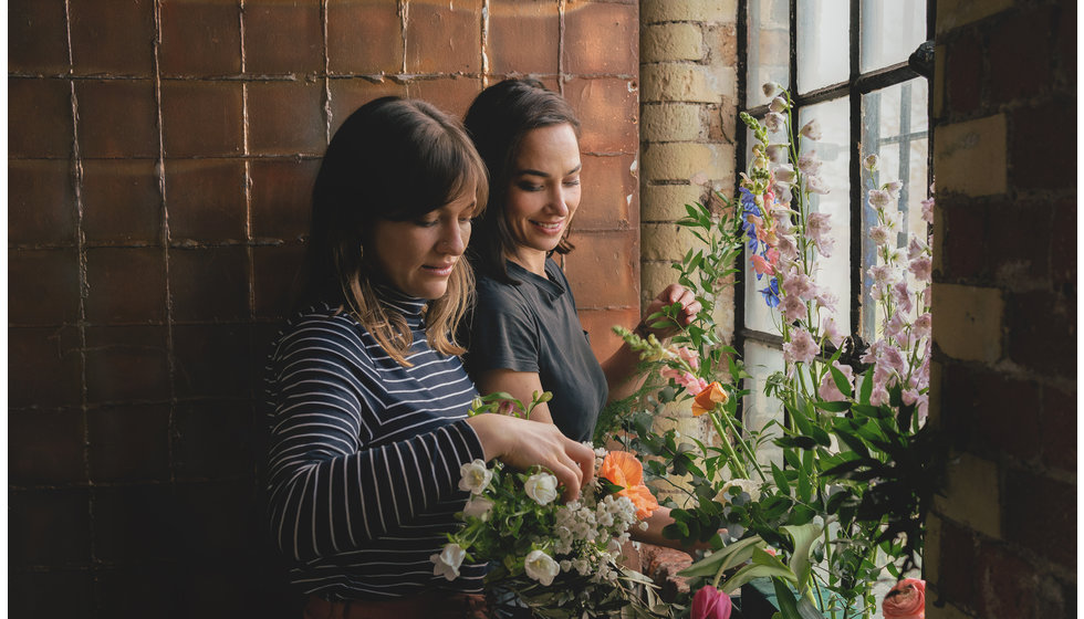 Lex Hamilton organising a Spring Wedding Flower Display.