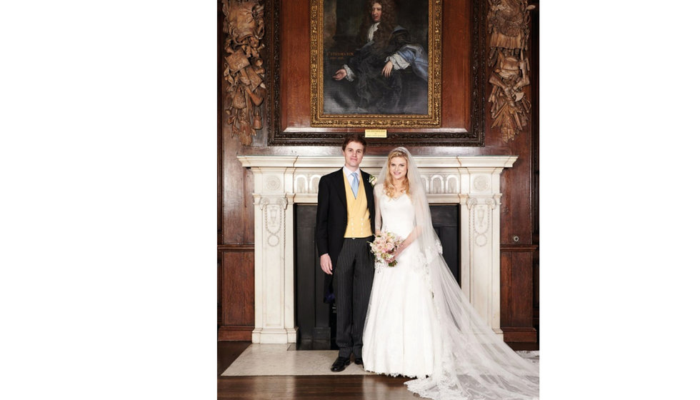 The bride and groom inside the old Chelsea Hospital.