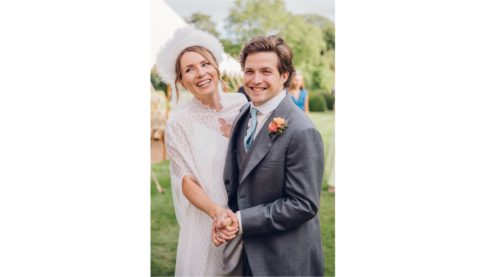 The bride and groom outside their intimate marquee.