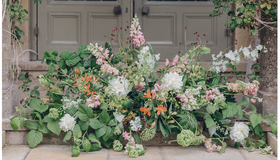 A lovely wild and colourful arrangement of flowers outside the Church.