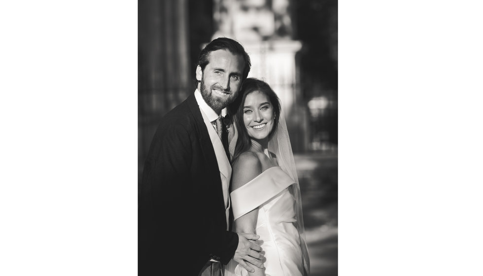 A black and white portrait of Lauren and Ed.