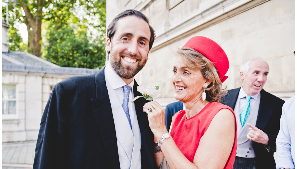 The groom and his mother on his wedding day outside the Church.