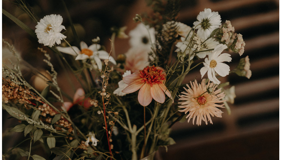 Louise's muted bouquet of flowers - perfect for a relaxed September wedding.