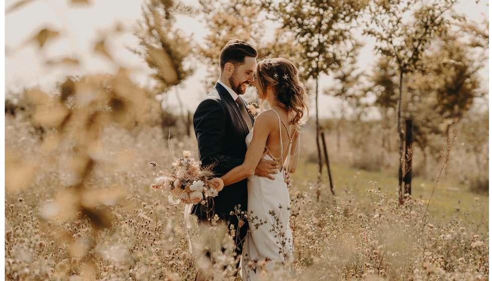 The bride and groom are planning to have another wedding celebration next year. 