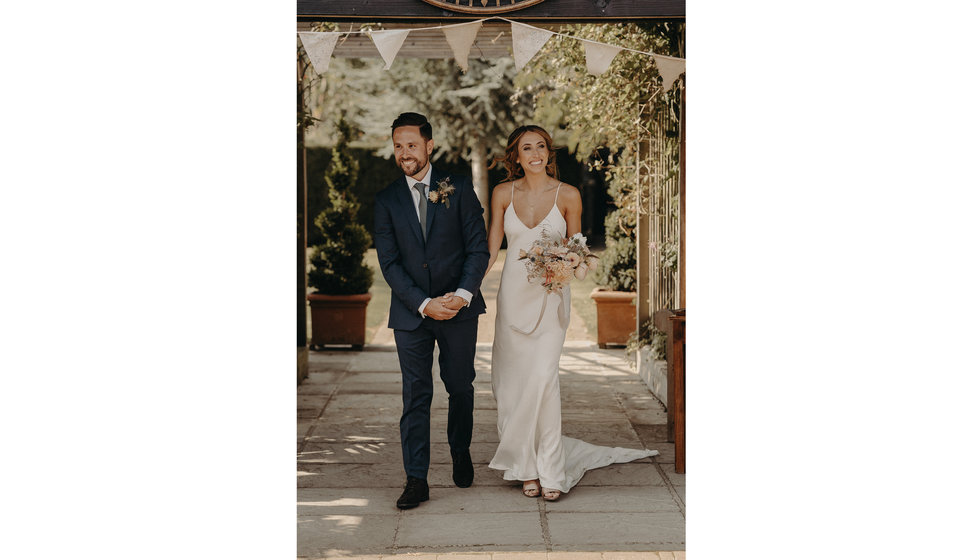 The bride and groom at their intimate wedding in Essex in September. 