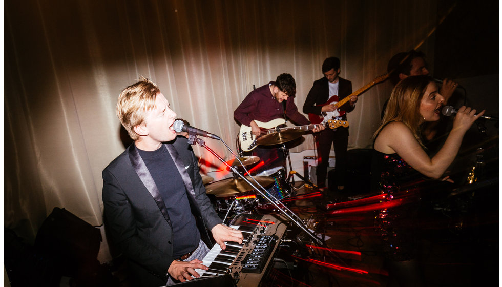 The band performing at the bride and groom's wedding reception.