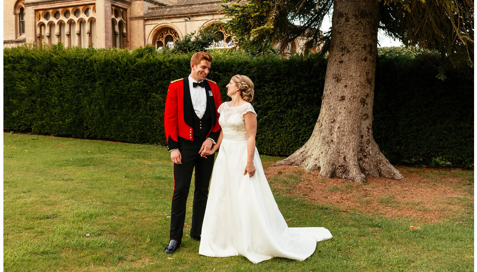 The bride Charlotte and groom in the grounds of their country hotel. 