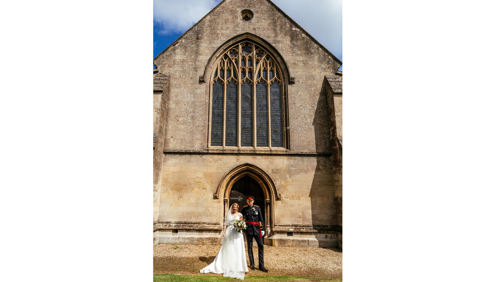 The bride and groom outside the Church in Wiltshire where they got married. 