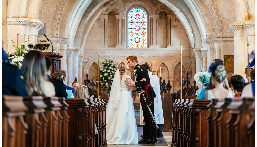 Matt and Charlotte in a Church where they married. 