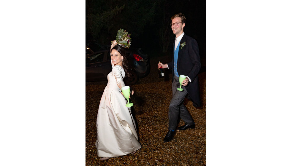 The bride and groom outside on their wedding evening. 